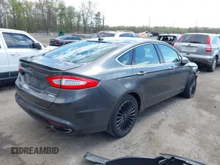 2015 Ford Fusion Titanium with VIN 3FA6P0K96FR283763, listed as a IAAI auction lot 42046868 with 104,542 mi miles. Bid and sale history available at carsss.com. Image 4.