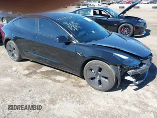 2023 Tesla Model 3 Long Range with VIN 5YJ3E1EB1PF632595, listed as a IAAI auction lot 41754131 with 8,147 mi miles and . Bid and sale history available at DreamBid. Image 1.