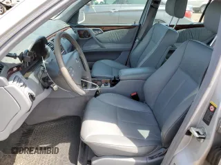 2002 Mercedes-Benz E-Class with VIN WDBJF82J92X065591, listed as a Copart auction lot 65841964 with 155,195 mi miles and Salvage Title. Bid and sale history available at carsss.com. Image 7.