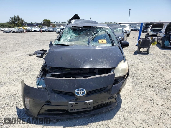 2013 Toyota Prius One z VIN JTDKN3DU7D0345945, wystawiony jako Copart lot #57703325 z przebiegiem Nie podano mil oraz Szkoda całkowita • Salvage title. Historia ofert i sprzedaży dostępna na DreamBid. Obrazek 5.