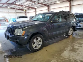 2006 Jeep Grand Cherokee Laredo with VIN 1J4HS48N16C351585, listed as a Copart auction lot 80783644 with 105,684 mi miles and Salvage Title. Bid and sale history available at carsss.com. Image 1.