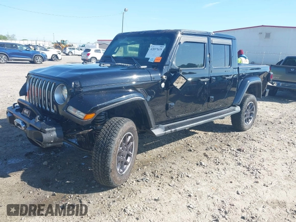 2023 Jeep Gladiator Overland z VIN 1C6HJTFG9PL549685, wystawiony jako IAAI lot #42037635 z przebiegiem 40 734 mil mil oraz . Historia ofert i sprzedaży dostępna na DreamBid. Obrazek 2.