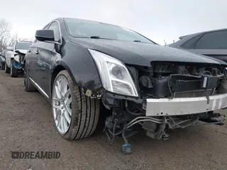 2014 Cadillac XTS Platinum with VIN 2G61W5S84E9291640, listed as a IAAI auction lot 41877867 with 100,462 mi miles and . Bid and sale history available at DreamBid. Image 18.