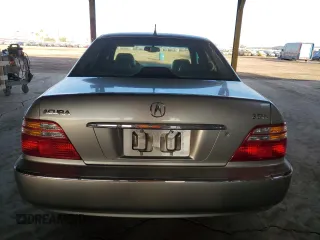 2002 Acura RL z VIN JH4KA96522C015919, wystawiony jako Copart lot #43828005 z przebiegiem 242 344 mil mil oraz Szkoda całkowita • Salvage title. Historia ofert i sprzedaży dostępna na DreamBid. Obrazek 6.