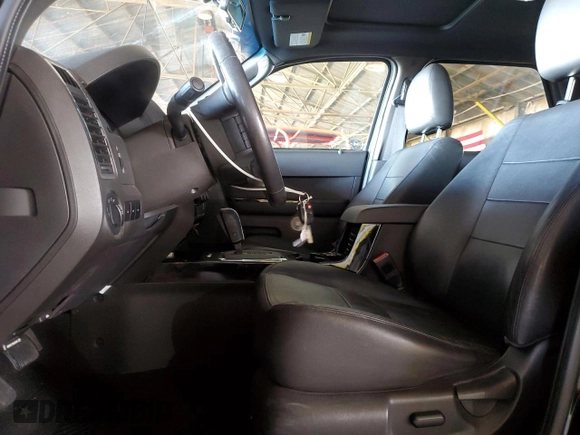 2010 Ford Escape Limited with VIN 1FMCU9EG2AKA78650, listed as a Copart auction lot 54402195 with 103,547 mi miles and Salvage title. Bid and sale history available at DreamBid. Image 7.