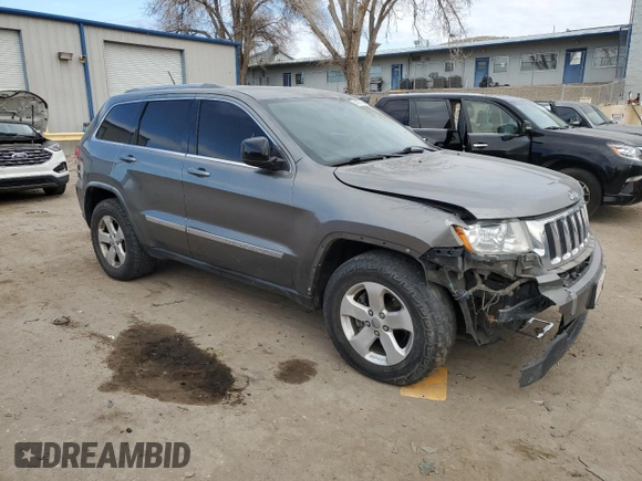 2012 Jeep Grand Cherokee Laredo with VIN 1C4RJFAT3CC204245, listed as a Copart auction lot 41707195 with 172,014 mi miles and Salvage Title. Bid and sale history available at carsss.com. Image 4.