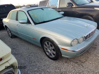 2005 Jaguar XJ with VIN SAJWA79C05SG37189, listed as a Copart auction lot 76804104 with 0 mi miles and Salvage Title. Bid and sale history available at carsss.com. Image 4.