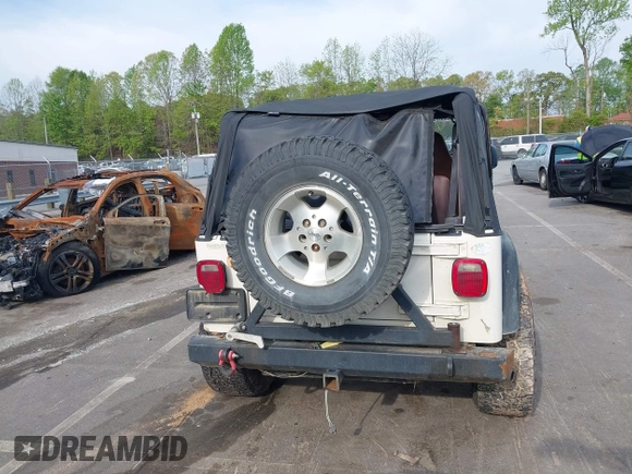 1998 Jeep Wrangler Sport with VIN 1J4FY19S5WP788331, listed as a IAAI auction lot 42027717 with 201,119 mi miles and . Bid and sale history available at DreamBid. Image 16.
