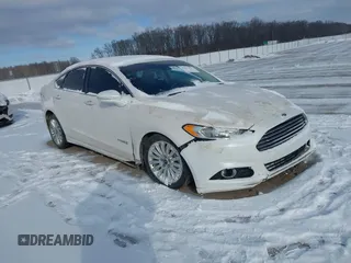 2014 Ford Fusion SE Hybrid with VIN 3FA6P0LU8ER192043, listed as a IAAI auction lot 41617422 with 131,772 mi miles. Bid and sale history available at carsss.com. Image 1.
