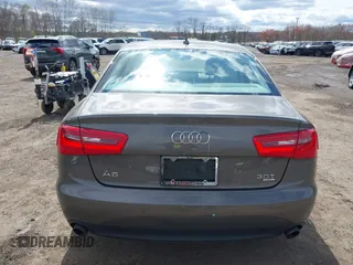 2013 Audi A6 Premium Plus z VIN WAUGGAFC1DN038375, wystawiony jako IAAI lot #42051929 z przebiegiem 118 181 mil mil oraz . Historia ofert i sprzedaży dostępna na DreamBid. Obrazek 16.