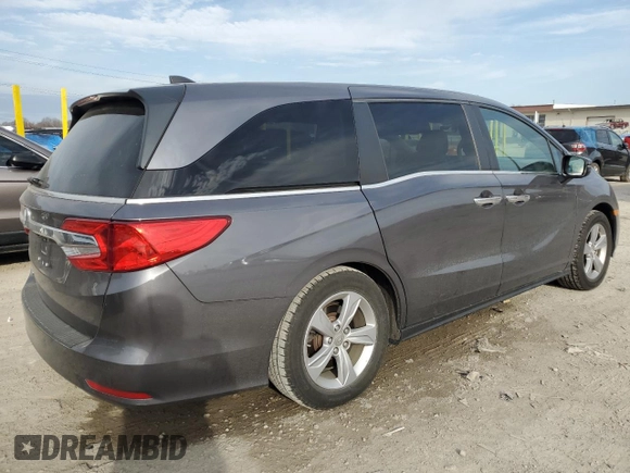 2019 Honda Odyssey EX-L with VIN 5FNRL6H75KB042882, listed as a Copart auction lot 49589845 with 90,835 mi miles and Salvage Title. Bid and sale history available at DreamBid. Image 3.