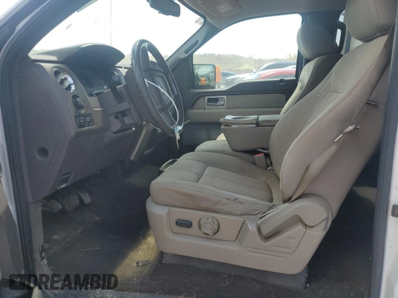 2010 Ford F-150 XL with VIN 1FTFW1EV9AFA76530, listed as a Copart auction lot 51303695 with 261,542 mi miles and Salvage Title. Bid and sale history available at DreamBid. Image 7.