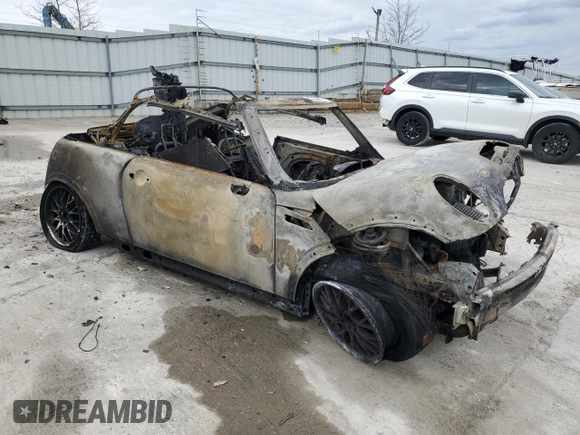 2006 MINI Convertible S with VIN WMWRH33536TK59031, listed as a Copart auction lot 51598825 with Not provided miles and Salvage title. Bid and sale history available at DreamBid. Image 4.