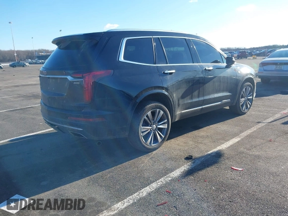 2022 Cadillac XT6 Premium Luxury with VIN 1GYKPDRS5NZ122060, listed as a IAAI auction lot 41584678 with 36,036 mi miles. Bid and sale history available at carsss.com. Image 4.