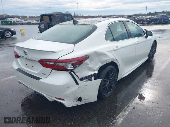 2022 Toyota Camry XSE z VIN 4T1K61AK2NU702362, wystawiony jako IAAI lot #41963393 z przebiegiem 13 541 mil mil oraz . Historia ofert i sprzedaży dostępna na DreamBid. Obrazek 4.