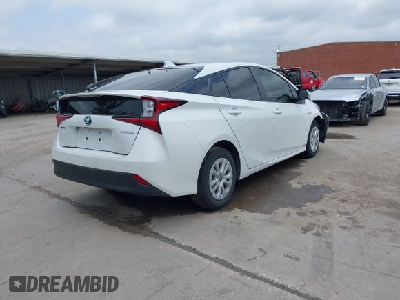 2022 Toyota Prius L Eco with VIN JTDKAMFUXN3157225, listed as a IAAI auction lot 39292379 with 59,333 mi miles and . Bid and sale history available at DreamBid. Image 4.