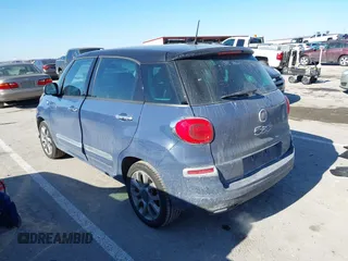 2020 FIAT 500L with VIN ZFBNFACHXLZ042819, listed as a IAAI auction lot 41442734 with 112,406 mi miles and . Bid and sale history available at DreamBid. Image 3.