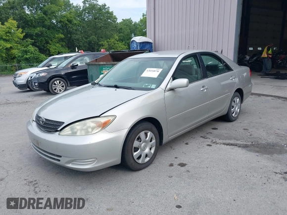 2004 Toyota Camry LE with VIN 4T1BE32K14U857478, listed as a IAAI auction lot 42654878 with 210,542 mi miles and . Bid and sale history available at DreamBid. Image 2.