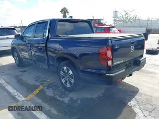 2017 Honda Ridgeline RTL-T with VIN 5FPYK2F68HB001759, listed as a IAAI auction lot 41562343 with 59,633 mi miles and . Bid and sale history available at DreamBid. Image 3.