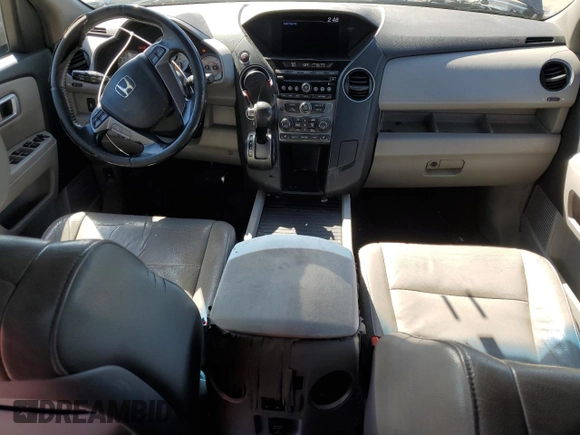 2012 Honda Pilot EX-L with VIN 5FNYF4H5XCB007889, listed as a Copart auction lot 52284075 with 318,329 mi miles and Salvage Title. Bid and sale history available at DreamBid. Image 8.