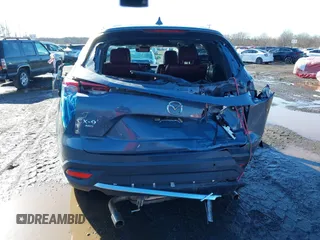 2021 Mazda CX-9 Grand Touring with VIN JM3TCBDY5M0506632, listed as a IAAI auction lot 41589264 with 50,026 mi miles and . Bid and sale history available at carsss.com. Image 16.