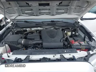 2018 Toyota Tacoma SR5 with VIN 3TMDZ5BN9JM051105, listed as a IAAI auction lot 41708034 with 98,000 mi miles and . Bid and sale history available at DreamBid. Image 10.