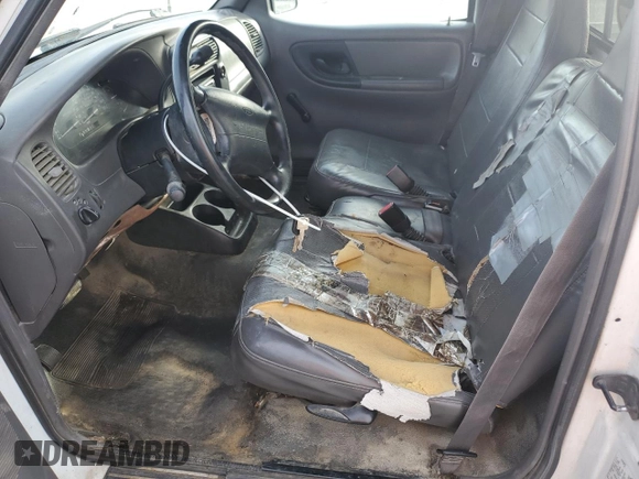 2002 Ford Ranger XL with VIN 1FTYR10DX2TA66722, listed as a Copart auction lot 54425765 with 246,813 mi miles and Non repairable. Bid and sale history available at DreamBid. Image 7.