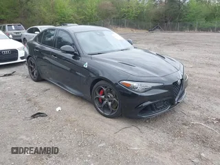 2023 Alfa Romeo Giulia Quadrifoglio with VIN ZARFAMEV9P7677087, listed as a IAAI auction lot 41844582 with 32,610 mi miles and . Bid and sale history available at DreamBid. Image 1.