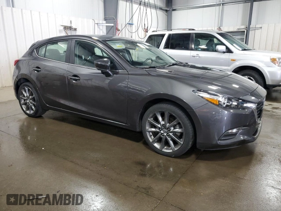 2018 Mazda 3 Touring with VIN 3MZBN1L37JM270277, listed as a Copart auction lot 55070135 with 24,392 mi miles and Salvage Title. Bid and sale history available at DreamBid. Image 4.