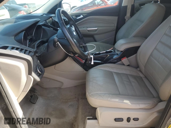 2016 Ford Escape Titanium with VIN 1FMCU0JX2GUA20567, listed as a Copart auction lot 48395825 with 209,786 mi miles and Clean Title. Bid and sale history available at carsss.com. Image 7.