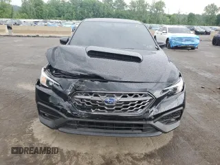 2023 Subaru WRX Premium z VIN JF1VBAF63P9821154, wystawiony jako Copart lot #61098765 z przebiegiem Nie podano mil oraz Szkoda całkowita • Salvage title. Historia ofert i sprzedaży dostępna na DreamBid. Obrazek 5.
