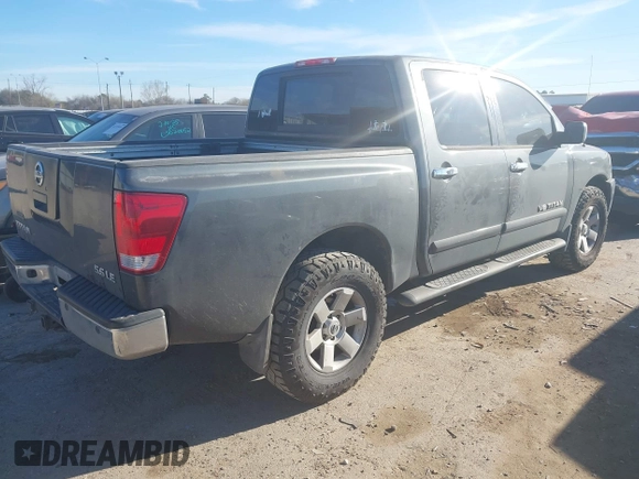 2005 Nissan Titan LE with VIN 1N6AA07B65N501054, listed as a IAAI auction lot 41728466 with 318,859 mi miles. Bid and sale history available at carsss.com. Image 4.