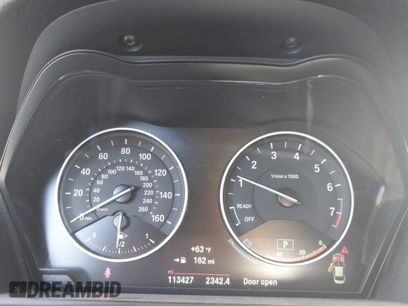 2015 BMW 2 Series 228i xDrive with VIN WBA1F7C5XFV367287, listed as a IAAI auction lot 40802463 with 113,427 mi miles and . Bid and sale history available at carsss.com. Image 7.