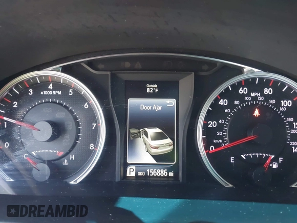 2015 Toyota Camry XLE with VIN 4T1BF1FK4FU477825, listed as a IAAI auction lot 41988429 with 156,886 mi miles and . Bid and sale history available at DreamBid. Image 7.