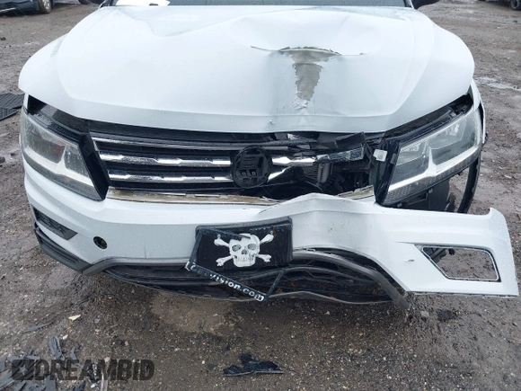 2019 Volkswagen Tiguan S with VIN 3VV0B7AX7KM031438, listed as a IAAI auction lot 42367337 with Not provided miles and . Bid and sale history available at DreamBid. Image 6.