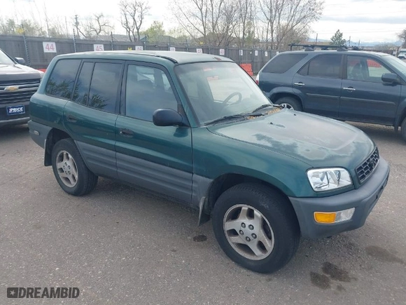 1998 Toyota RAV4 with VIN JT3GP10V5W0026814, listed as a IAAI auction lot 42003456 with 196,842 mi miles. Bid and sale history available at carsss.com. Image 1.