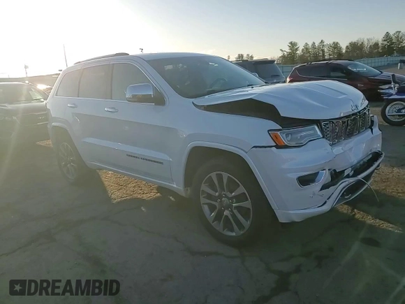 2017 Jeep Grand Cherokee Overland with VIN 1C4RJFCG8HC906200, listed as a Copart auction lot 49837375 with 108,852 mi miles and Salvage Title. Bid and sale history available at carsss.com. Image 12.