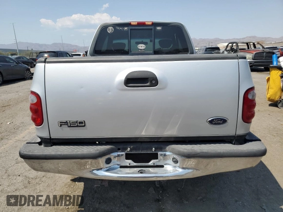 2001 Ford F-150 XL with VIN 1FTRX07L71KA57207, listed as a Copart auction lot 64843825 with Not provided miles and Salvage title. Bid and sale history available at DreamBid. Image 6.