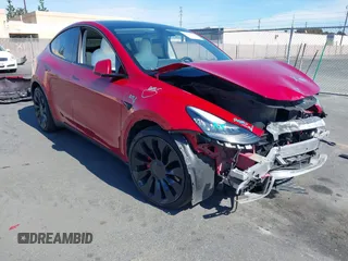 2021 Tesla Model Y Performance with VIN 5YJYGDEF4MF092062, listed as a IAAI auction lot 41583793 with 57,194 mi miles. Bid and sale history available at carsss.com. Image 1.