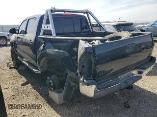 2013 Toyota Tacoma PreRunner z VIN 3TMJU4GN1DM143219, wystawiony jako Copart lot #57492905 z przebiegiem 131 898 mil mil oraz Szkoda całkowita • Salvage title. Historia ofert i sprzedaży dostępna na DreamBid. Obrazek 2.