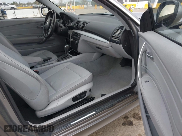 2010 BMW 1 Series 128i with VIN WBAUP9C52AVL89282, listed as a IAAI auction lot 41787668 with 152,976 mi miles and . Bid and sale history available at DreamBid. Image 5.