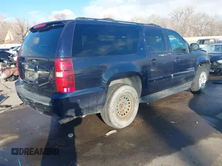 2008 Chevrolet Suburban LTZ with VIN 1GNFK16Y68R143010, listed as a IAAI auction lot 41209402 with 160,182 mi miles. Bid and sale history available at carsss.com. Image 4.
