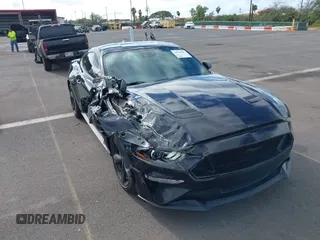 2021 Ford Mustang GT z VIN 1FA6P8CF1M5147740, wystawiony jako IAAI lot #38920487 z przebiegiem 15 299 mil mil oraz . Historia ofert i sprzedaży dostępna na DreamBid. Obrazek 19.