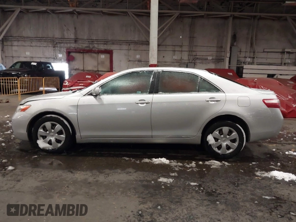 2009 Toyota Camry z VIN 4T1BE46KX9U352465, wystawiony jako IAAI lot #41518299 z przebiegiem 107 348 mil mil oraz . Historia ofert i sprzedaży dostępna na DreamBid. Obrazek 14.