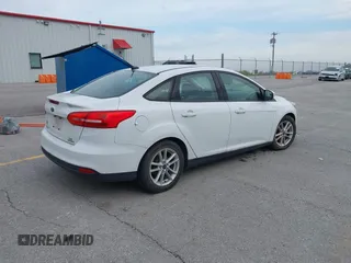 2015 Ford Focus SE with VIN 1FADP3F23FL255584, listed as a IAAI auction lot 41990636 with 151,389 mi miles. Bid and sale history available at carsss.com. Image 4.