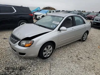 2009 Kia Spectra SX with VIN KNAFE221195656606, listed as a Copart auction lot 84694524 with Not Provided miles and Salvage Title. Bid and sale history available at carsss.com. Image 1.