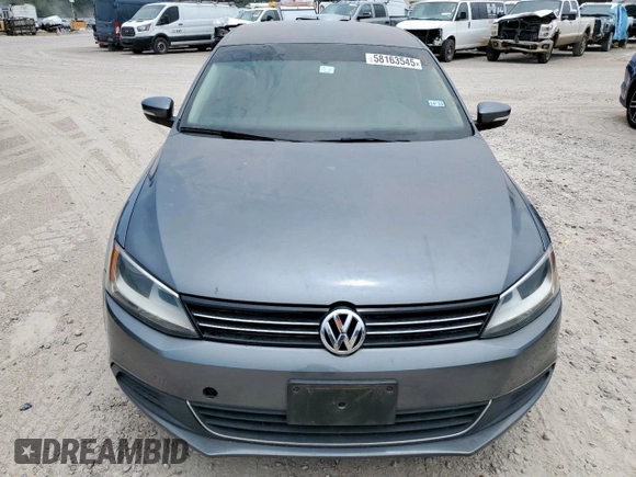 2014 Volkswagen Jetta TDI w/Premium with VIN 3VWLL7AJ9EM267112, listed as a Copart auction lot 58163545 with 106,367 mi miles and Clean title. Bid and sale history available at DreamBid. Image 5.
