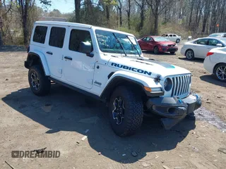 2023 Jeep Wrangler Rubicon z VIN 1C4JJXR68PW584303, wystawiony jako IAAI lot #42049098 z przebiegiem 29 565 mil mil oraz . Historia ofert i sprzedaży dostępna na DreamBid. Obrazek 1.