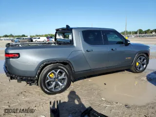 2022 Rivian R1T Adventure Package with VIN 7FCTGAAA6NN013037, listed as a Copart auction lot 75548964 with 8,877 mi miles and Salvage Title. Bid and sale history available at carsss.com. Image 3.
