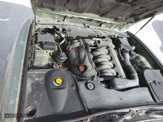 1999 Jaguar XJ with VIN SAJHD1043XC869413, listed as a Copart auction lot 76940624 with 0 mi miles and Salvage Title. Bid and sale history available at carsss.com. Image 11.